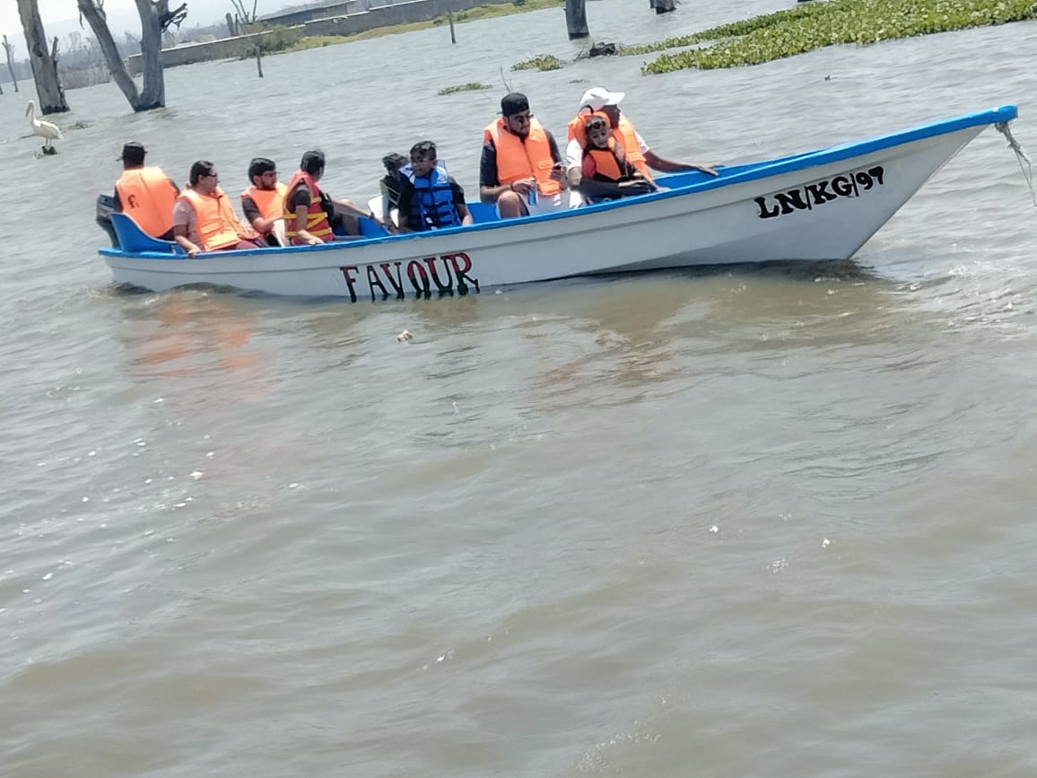 Group boat ride safari on Lake Naivasha with hippos and birds